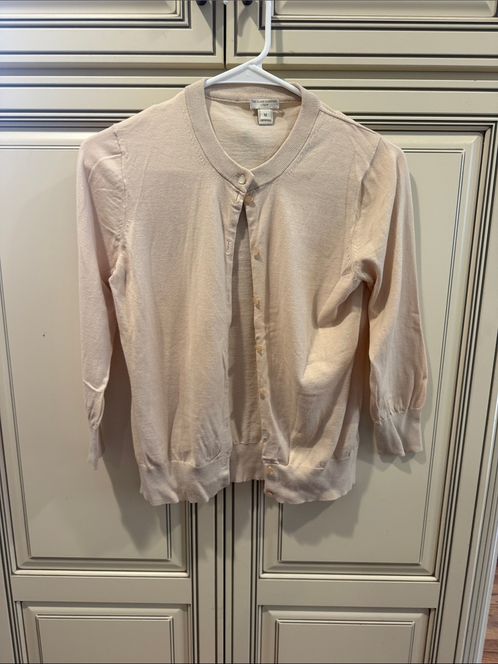 J Crew Women's Crewneck Button-Front Cardigan in tan/ cream.